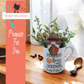 a coffee mug with a plant inside of it