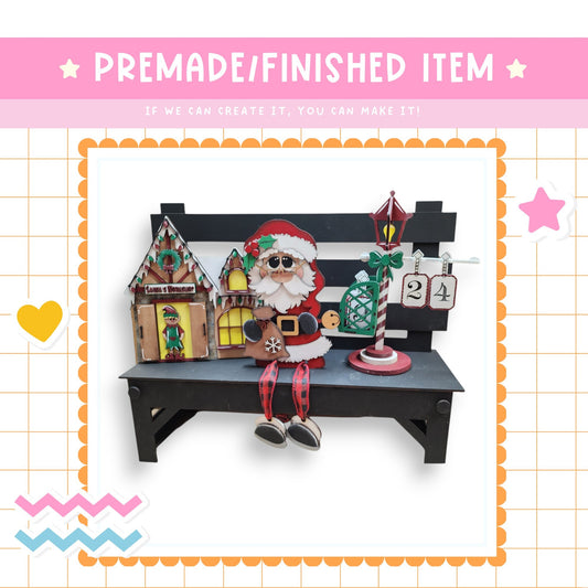 a picture of a bench with a santa clause sitting on it