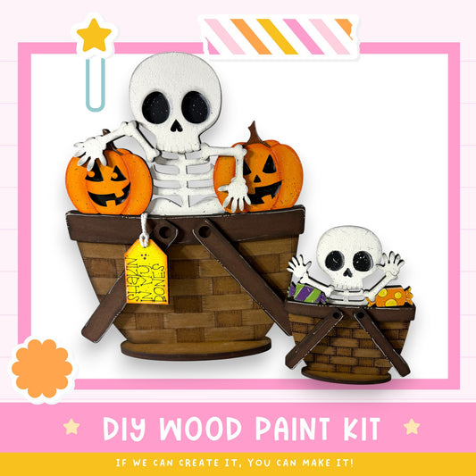 a DIY wood paint kit for creating Halloween decorations, including a skeleton and pumpkin-themed basket.