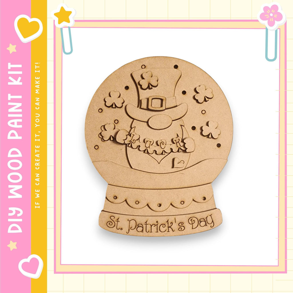 A wooden snow globe with a St. Patrick's Day design, featuring a leprechaun figure and clover decorations.