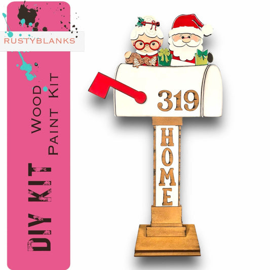 a mailbox with santa claus and other decorations