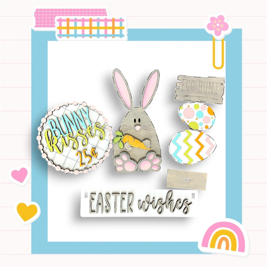 a picture of a happy easter card with a bunny and eggs