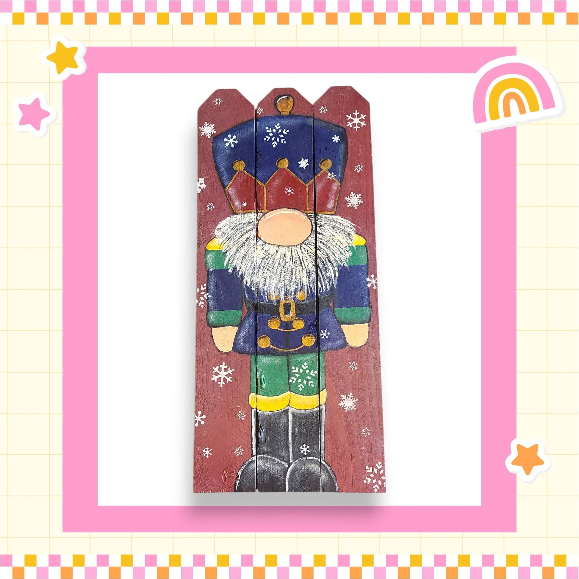 A wooden nutcracker figure with a colorful outfit and a crown, surrounded by snowflakes, is depicted in the image.