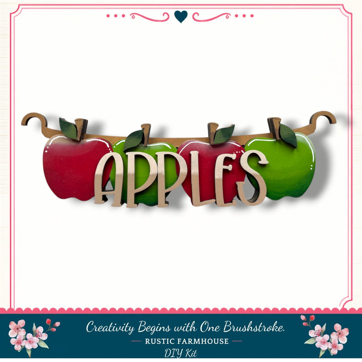 a wooden sign with the word "APPLES" written on it, along with three apples of different colors - red, green, and brown - attached to the sign.
