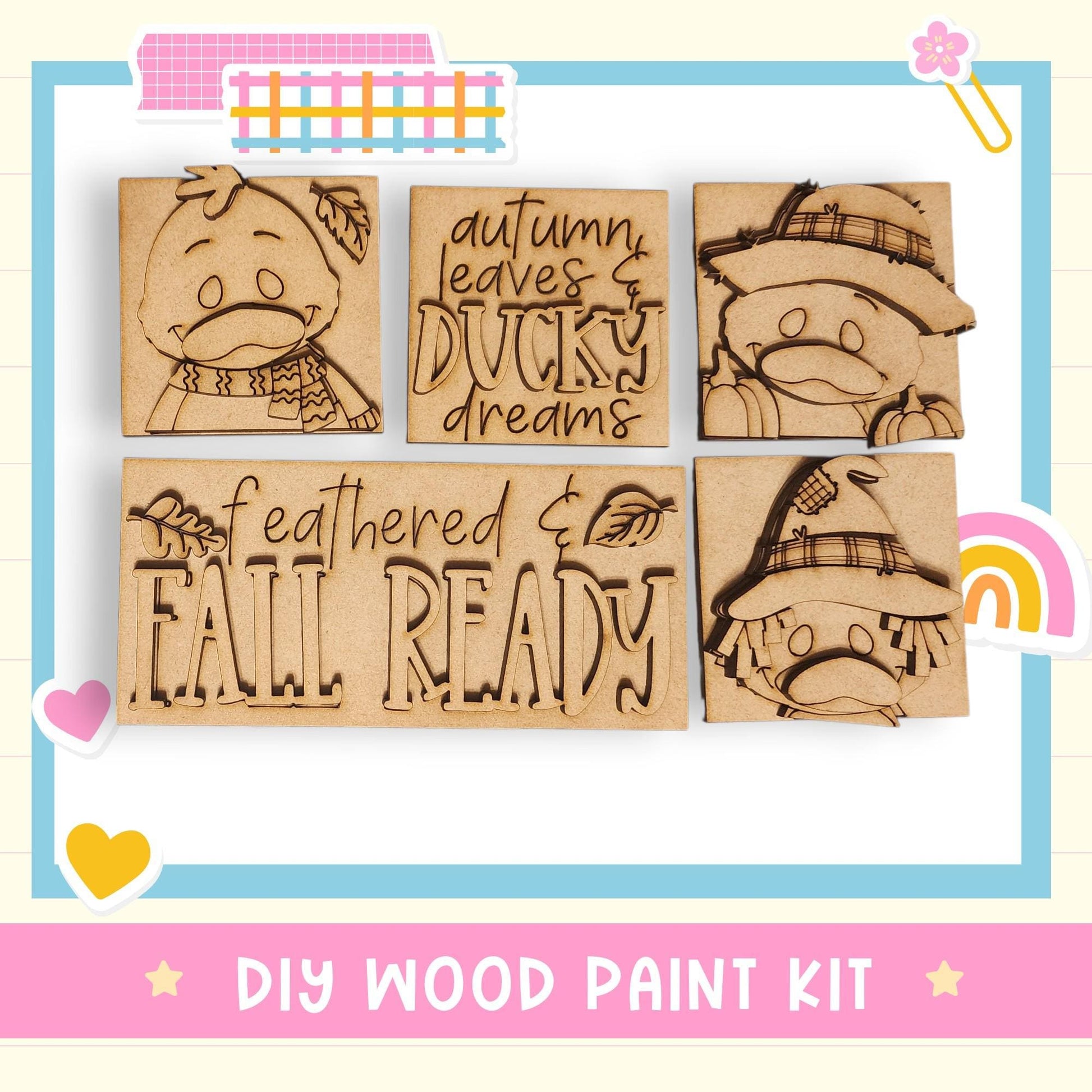 The image is a DIY wood paint kit featuring a collection of wooden cutouts with autumn leaves and a duck, along with the text "feathers & FALL READY".