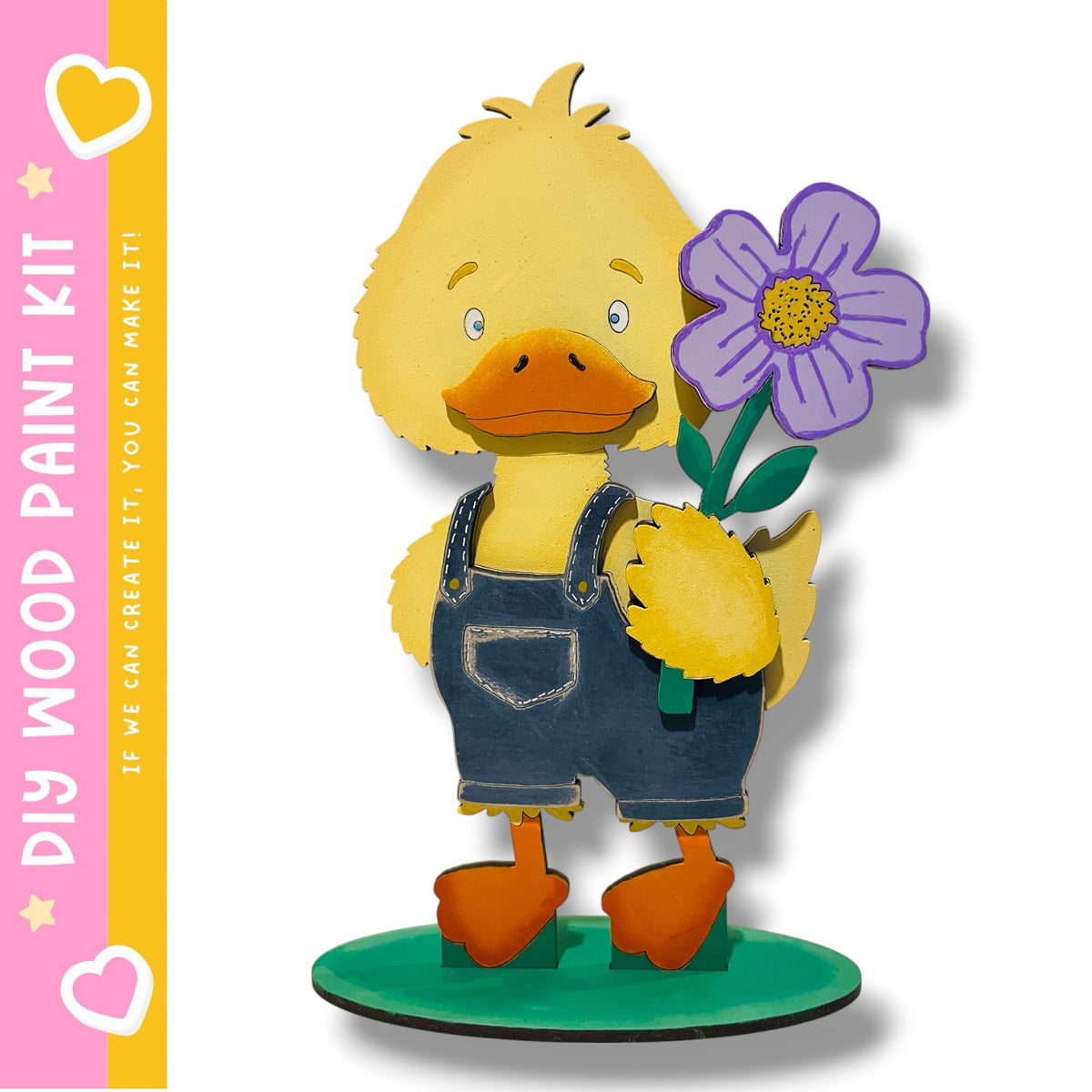 A yellow duck figurine holding a purple flower, standing on a green base.