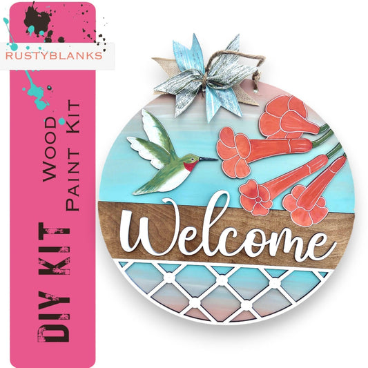 a welcome sign with a bird and flowers on it