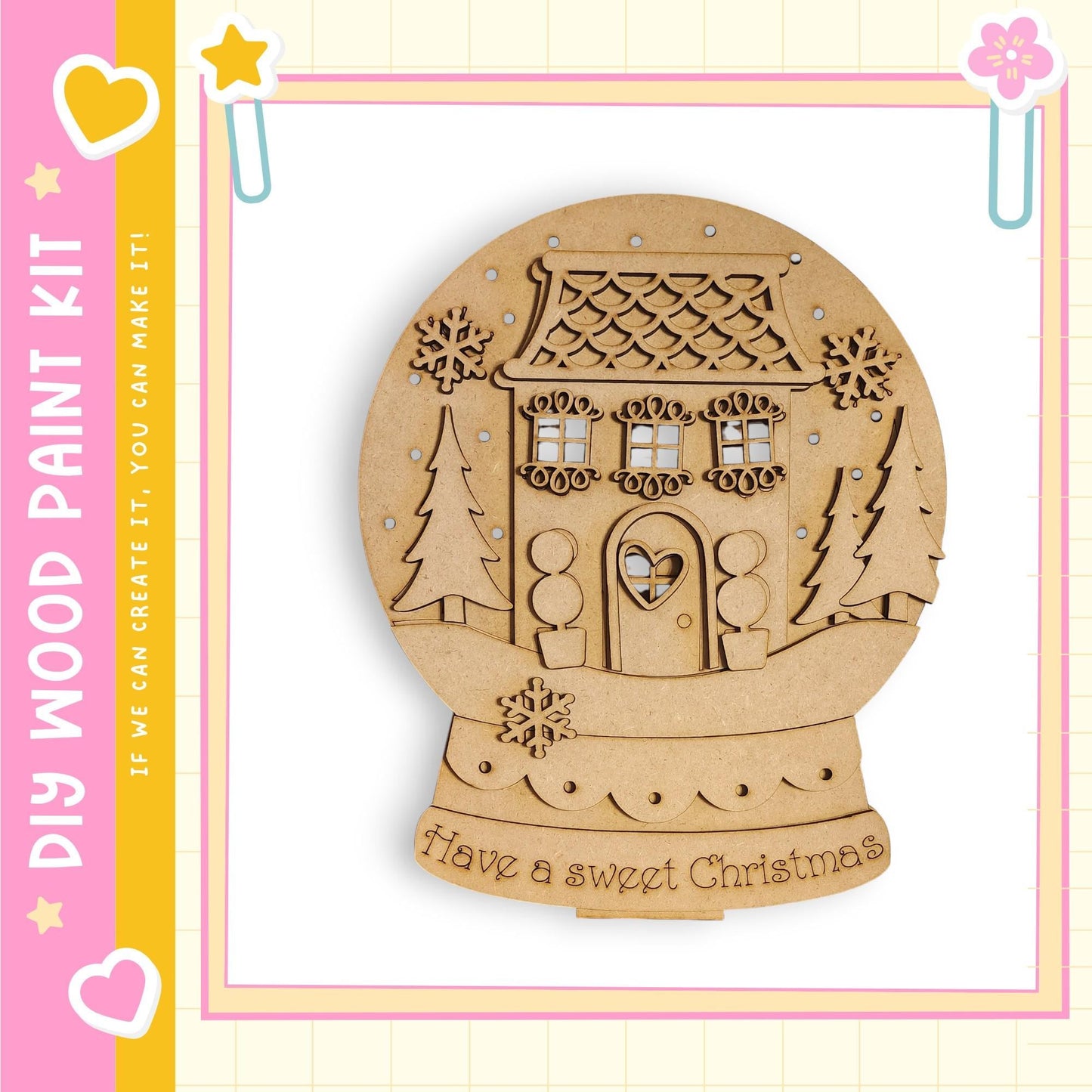 A wooden snow globe with a house and trees, along with the text "Have a sweet Christmas" on the base.