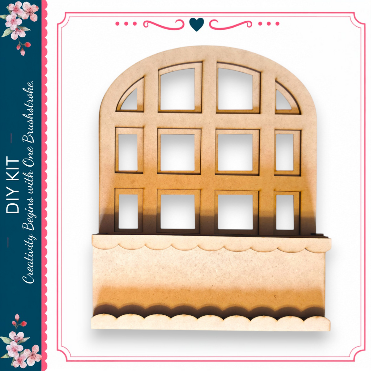 a wooden cutout of a window with a scalloped edge, set against a white background.