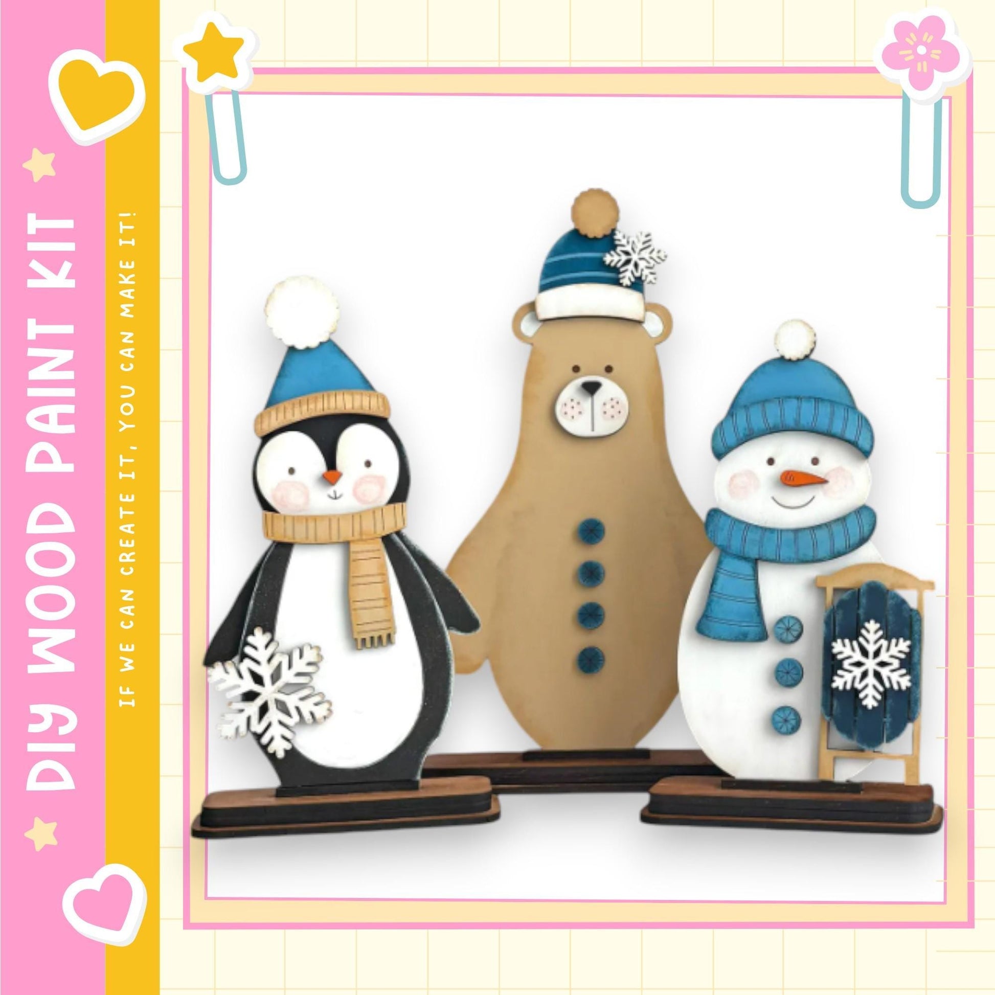 A wooden paint kit featuring three winter-themed figures: a penguin, a bear, and a snowman.