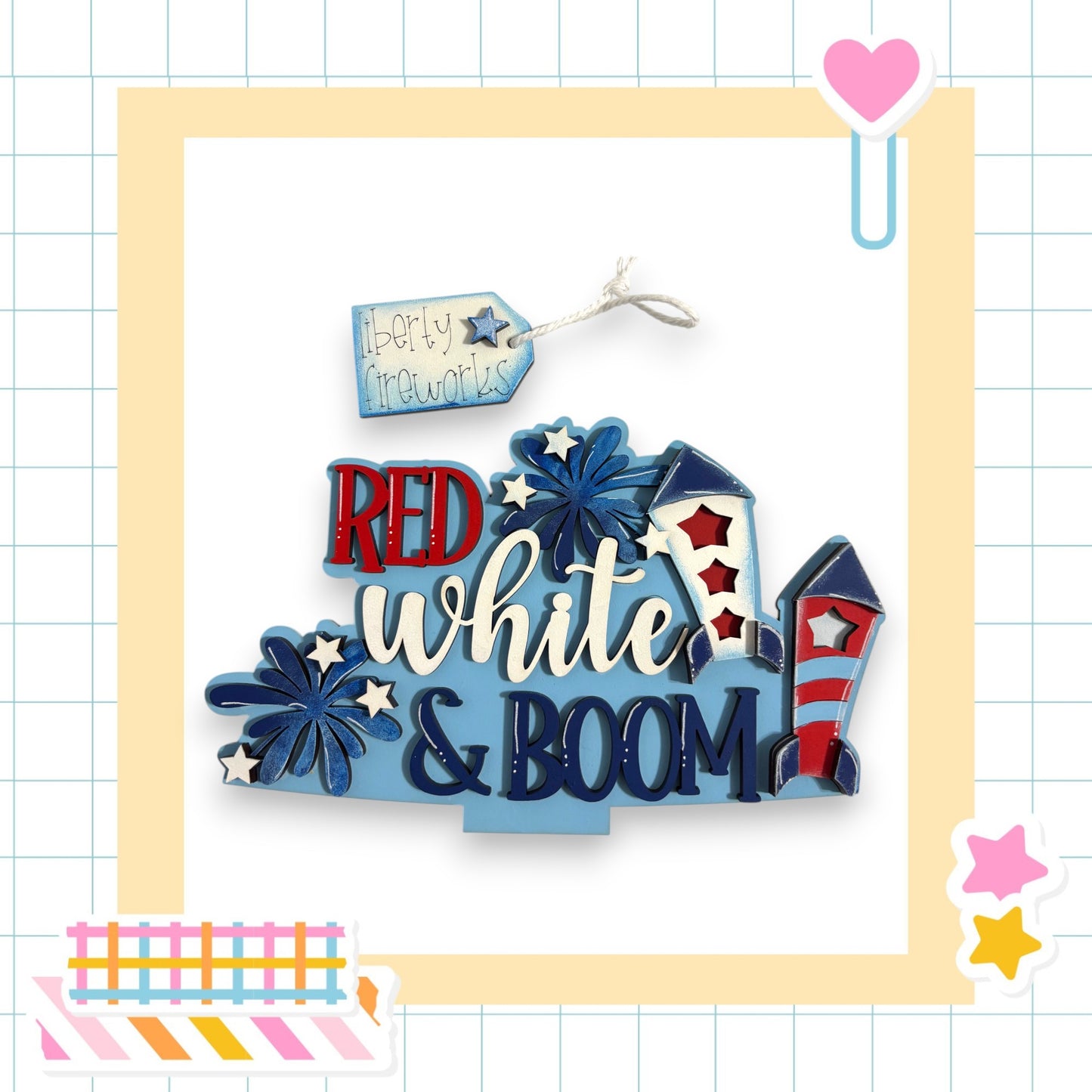 a collage of various patriotic-themed elements, including a sign that says "Liberty fireworks" and a rocket ship. The sign is blue and red, with the words "RED white & BOOM" written in white. The rocket ship is red and white, with the words "Liberty fireworks" written on it. The collage is set against a background with a grid pattern, and there are small decorative elements such as stars and a heart.