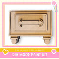 a DIY wood paint kit, with a wooden drawer and handle as the main focus. The kit appears to be made of wood and is designed for creating wooden items.
