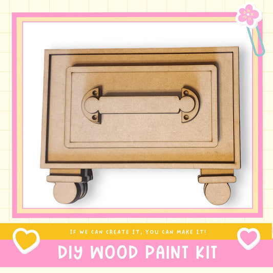 a DIY wood paint kit, with a wooden drawer and handle as the main focus. The kit appears to be made of wood and is designed for creating wooden items.