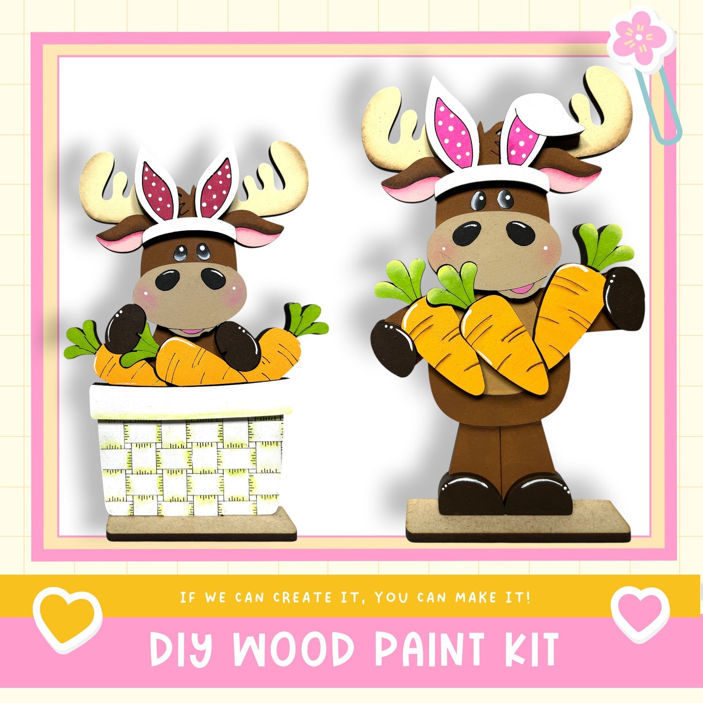 two wooden moose figurines, each holding a basket of carrots. The moose are wearing antlers and have pink ears. The image also includes text that says "DIY WOOD PAINT KIT" and "If we can create it, you can make it!"