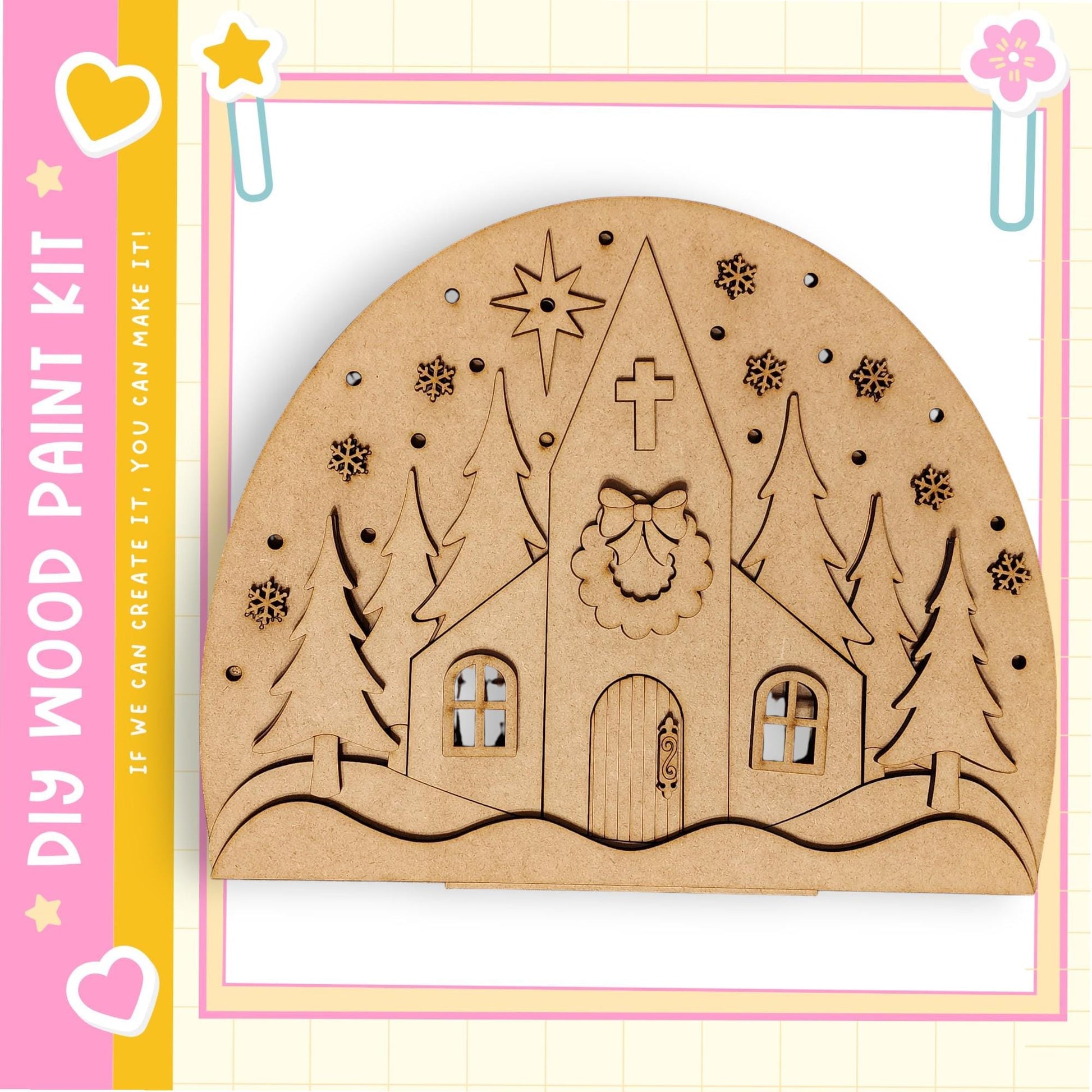 a wooden church with a wreath and snowflakes, set against a snowy landscape.