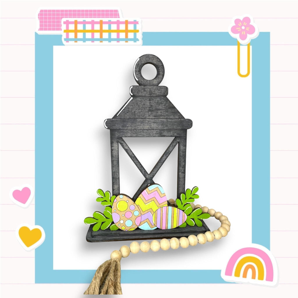 an easter card with a lantern and eggs