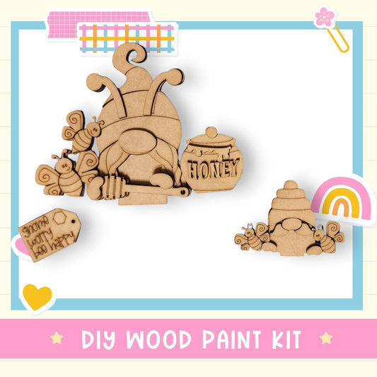 a wooden cutout of an elephant and a baby elephant