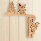 A wooden shelf with two wooden reindeer and a wooden Christmas tree on it.