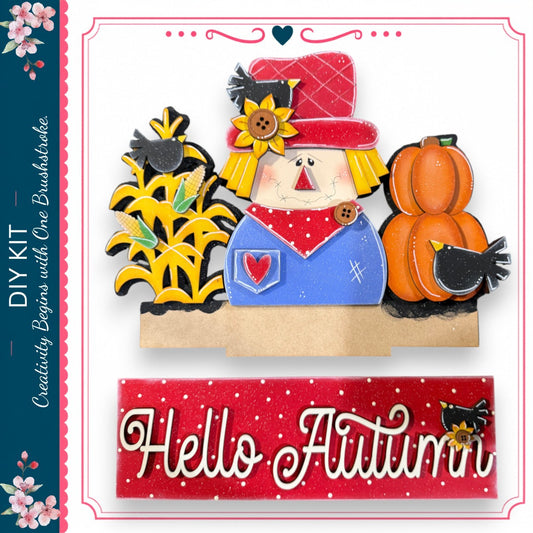 The image is a colorful illustration featuring a scarecrow, pumpkins, and a bird, with the text "Hello Autumn" displayed below.