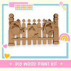 a cardboard cutout of a wooden fence