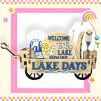 a wooden sign that says welcome to the lake days