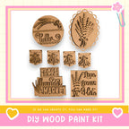 The image is a collage of various wooden paint kit pieces, including a "Hello" sign, a floral design, and a "Fresh lavender market" sign. The text "If we can create it, you can make it!" is displayed, indicating that the kit is designed for DIY wood paint projects.
