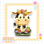 a picture of a cow with flowers on its head