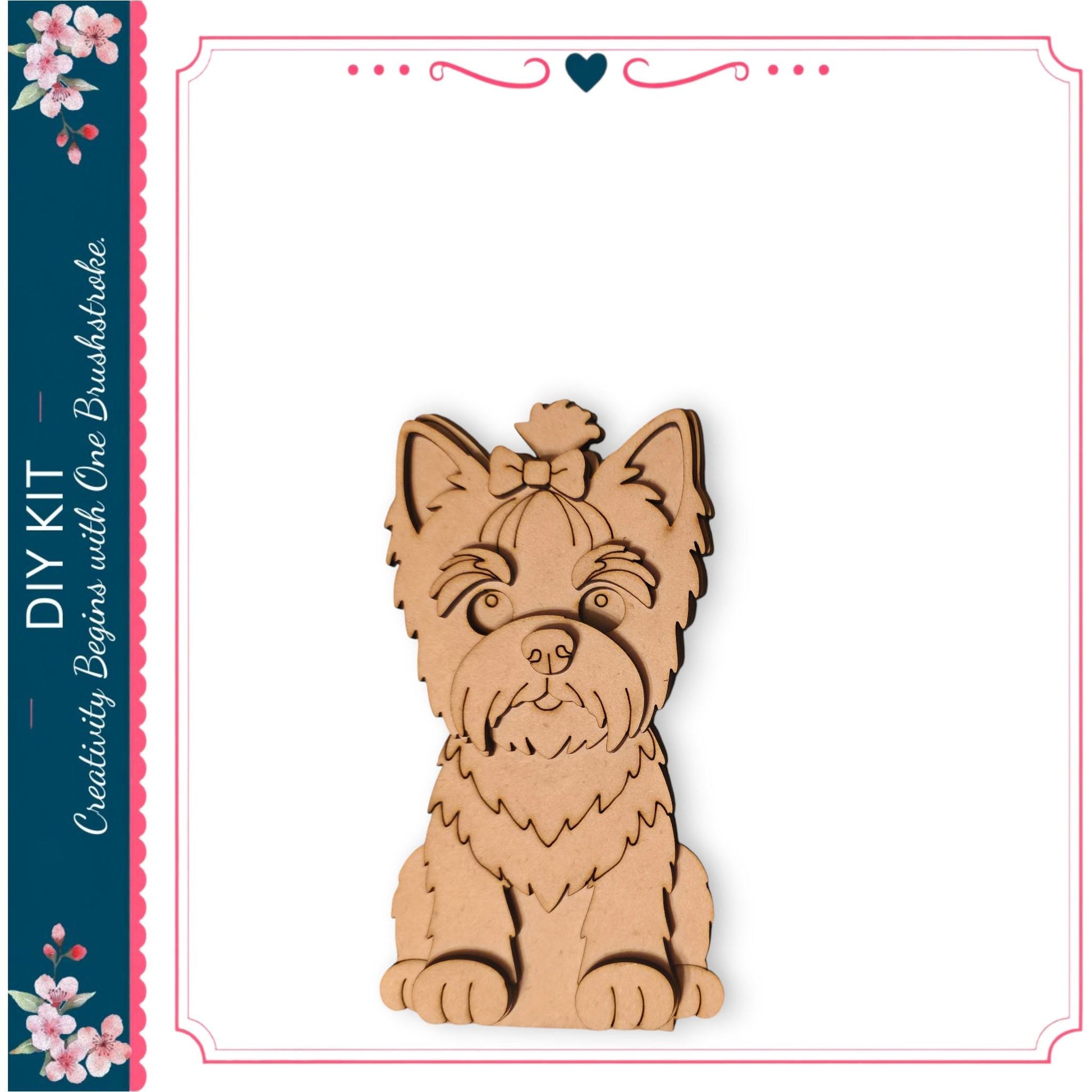 A wooden cutout of a dog, likely a Yorkshire Terrier, is displayed against a white background.