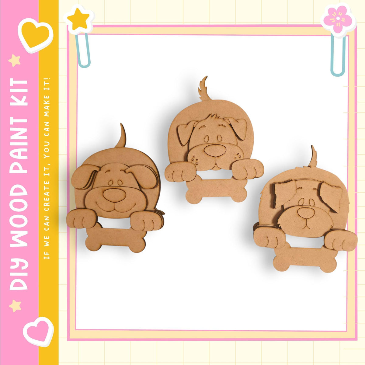 three wooden cutouts of cartoon dog characters, each holding a bone.
