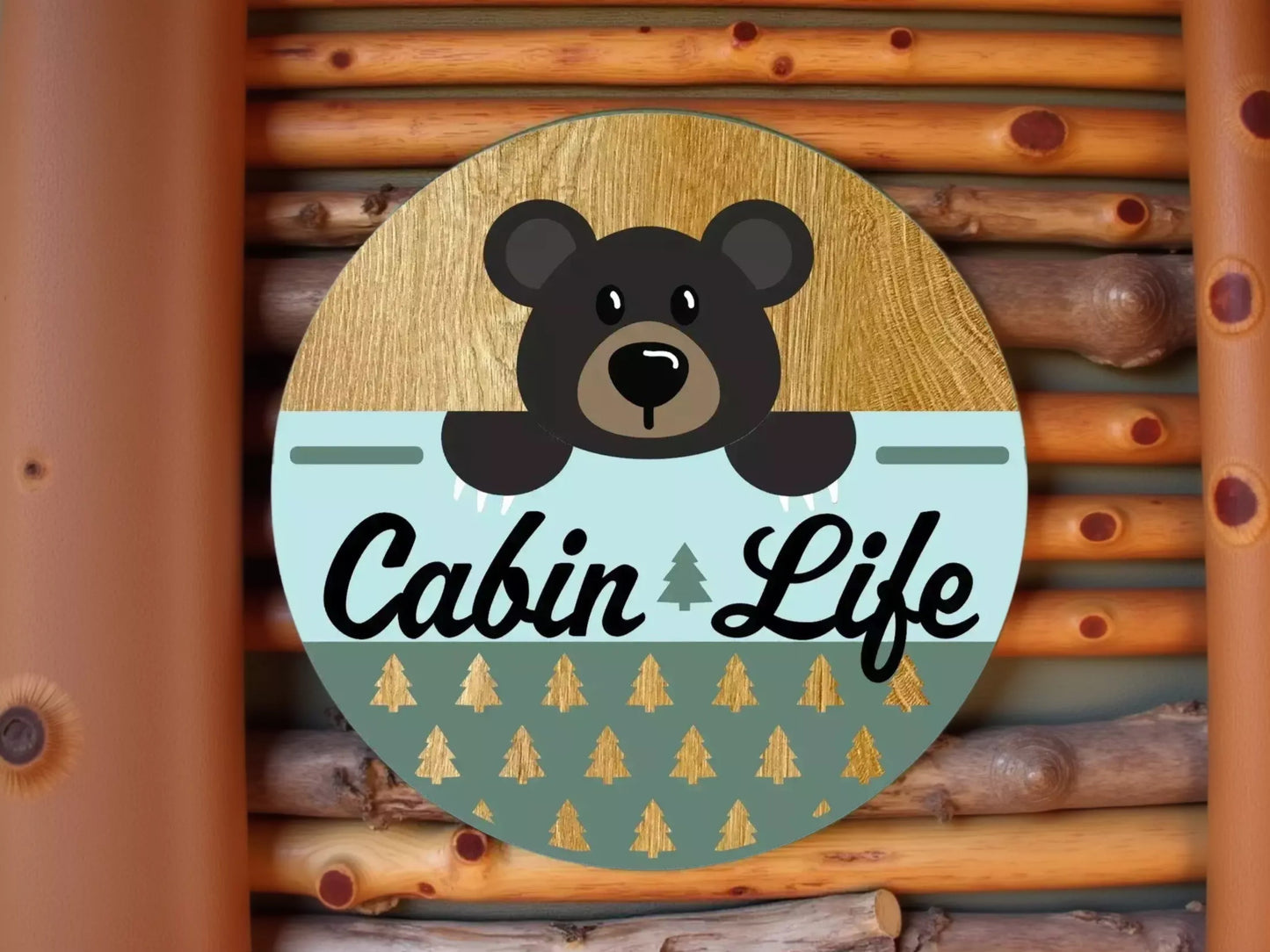 A circular sign with a cartoon bear and the text "Cabin Life" on it, set against a background of wooden logs.