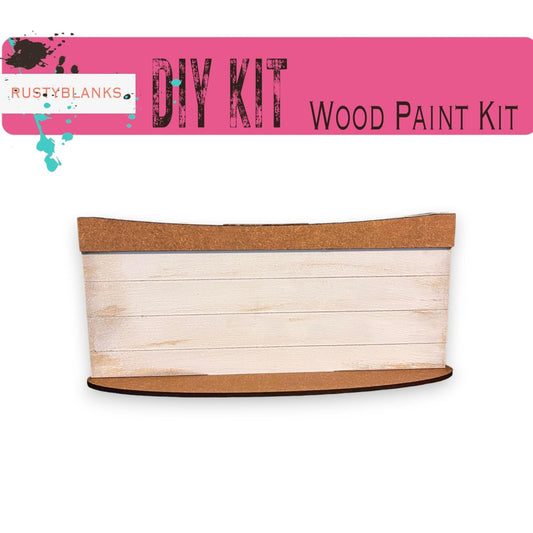 a wooden paint kit with a pink background