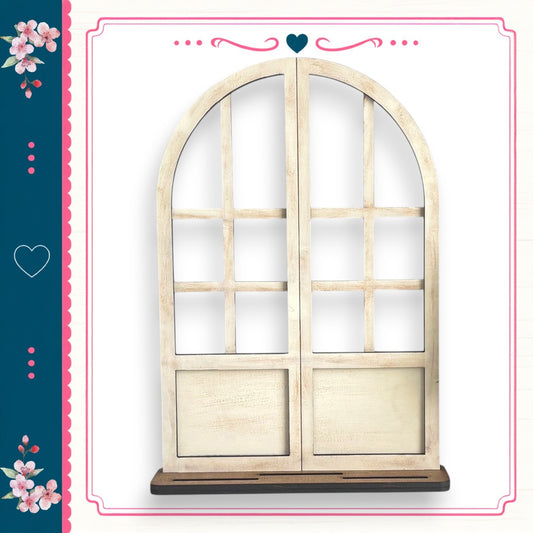 a white wooden archway with a heart symbol above it, set against a white background with a pink and blue border.