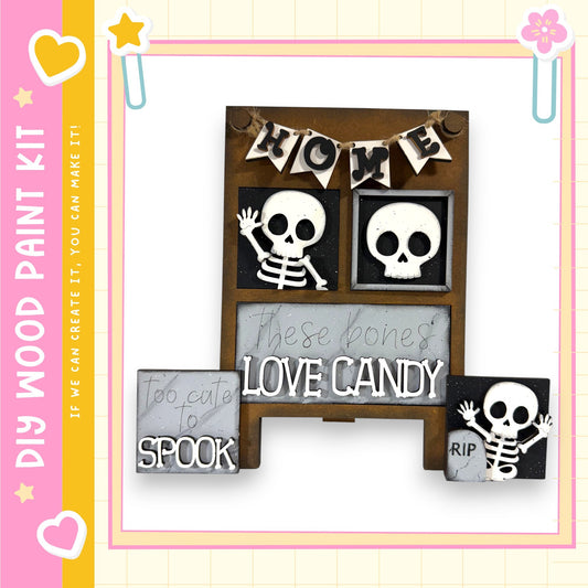 The image is a DIY paint kit featuring a skeleton-themed decoration with the words "HOME" and "Love Candy" displayed.