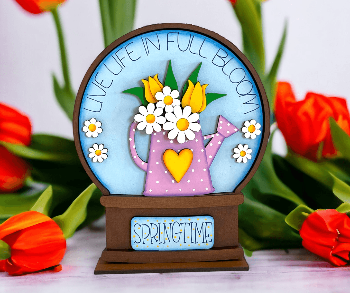 a picture of a clock with flowers on it