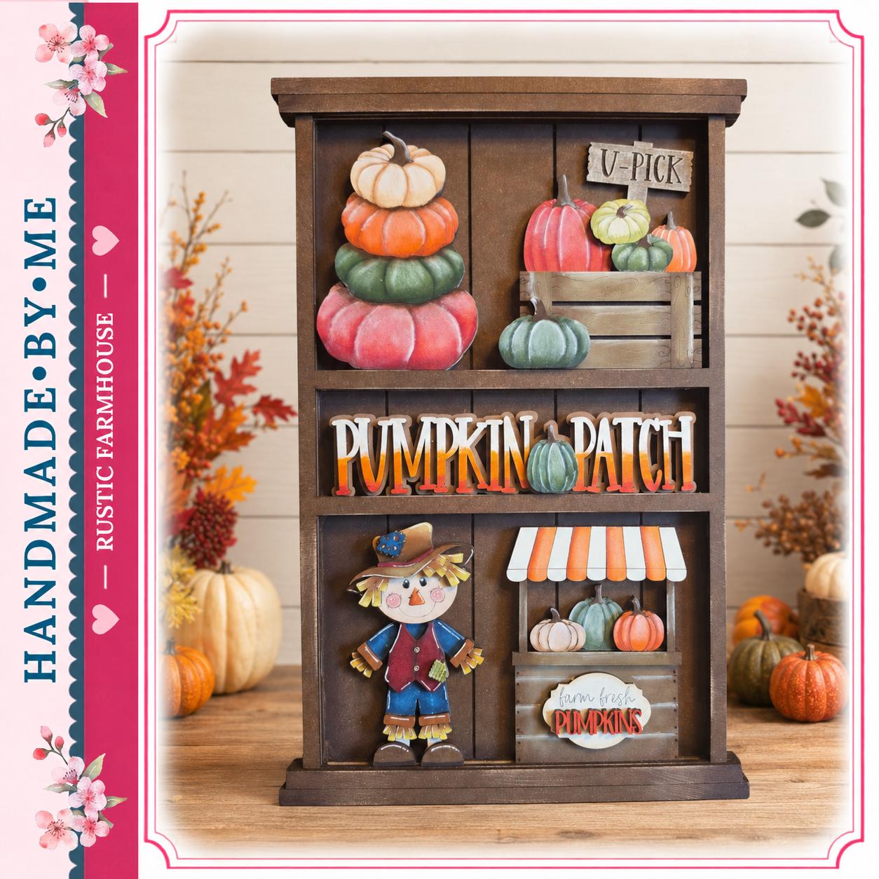 A rustic wooden pumpkin patch display with various fall decorations, including a scarecrow, pumpkins, and a sign that reads "U-pick". The display is set against a backdrop of fall foliage, creating a festive atmosphere.