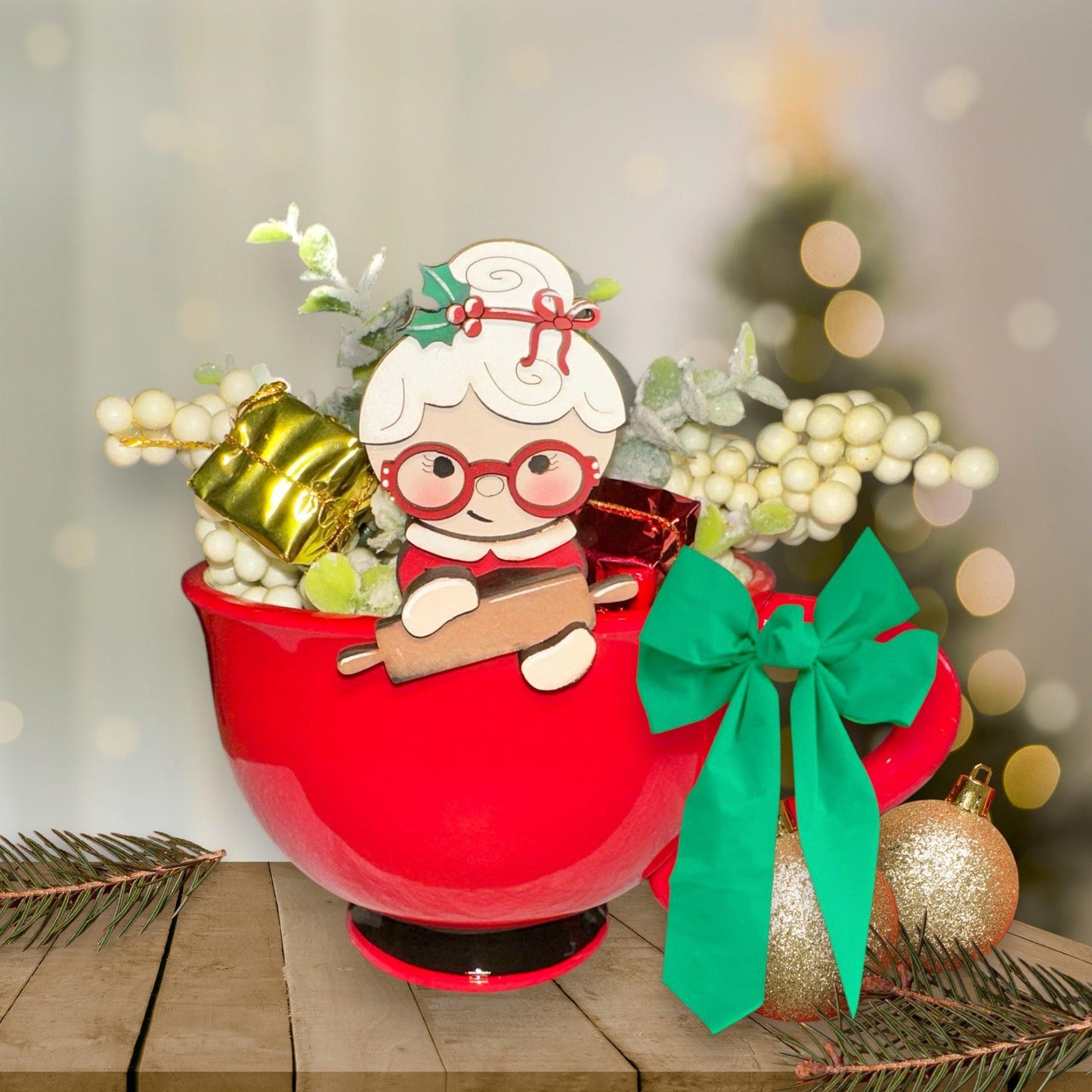 a red bowl filled with a christmas decoration