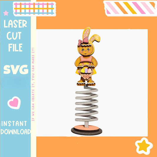 a colorful spring toy with a bunny figure on top of it, set against an orange background.