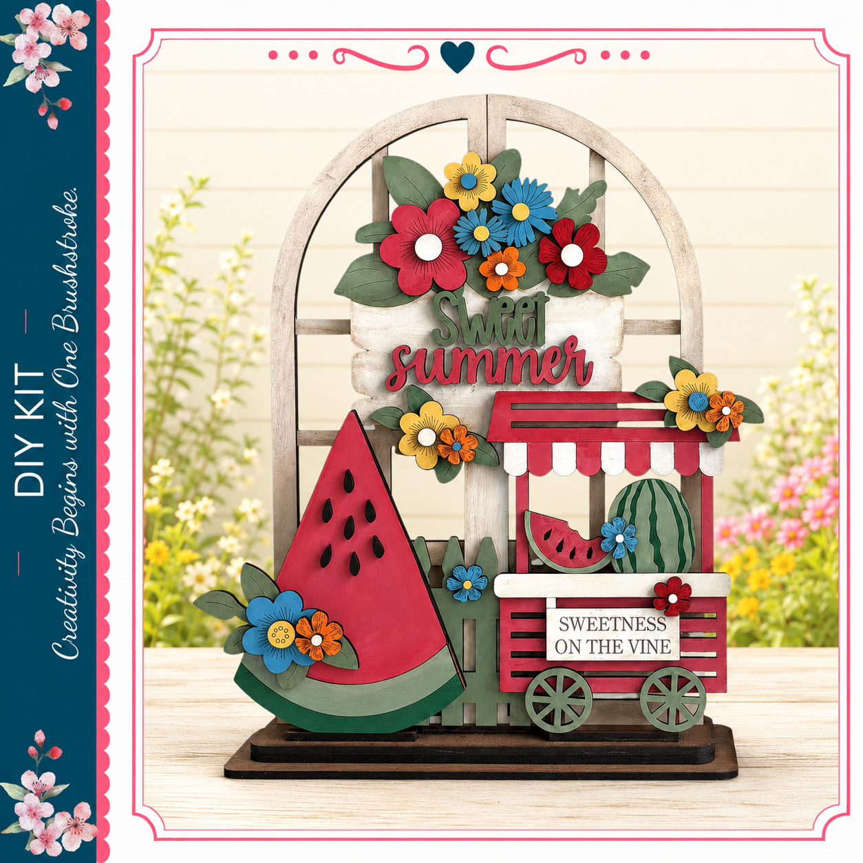 A wooden sign with a watermelon and flowers, along with a wagon labeled "Sweetness on the Vine", set against a backdrop of flowers and greenery.