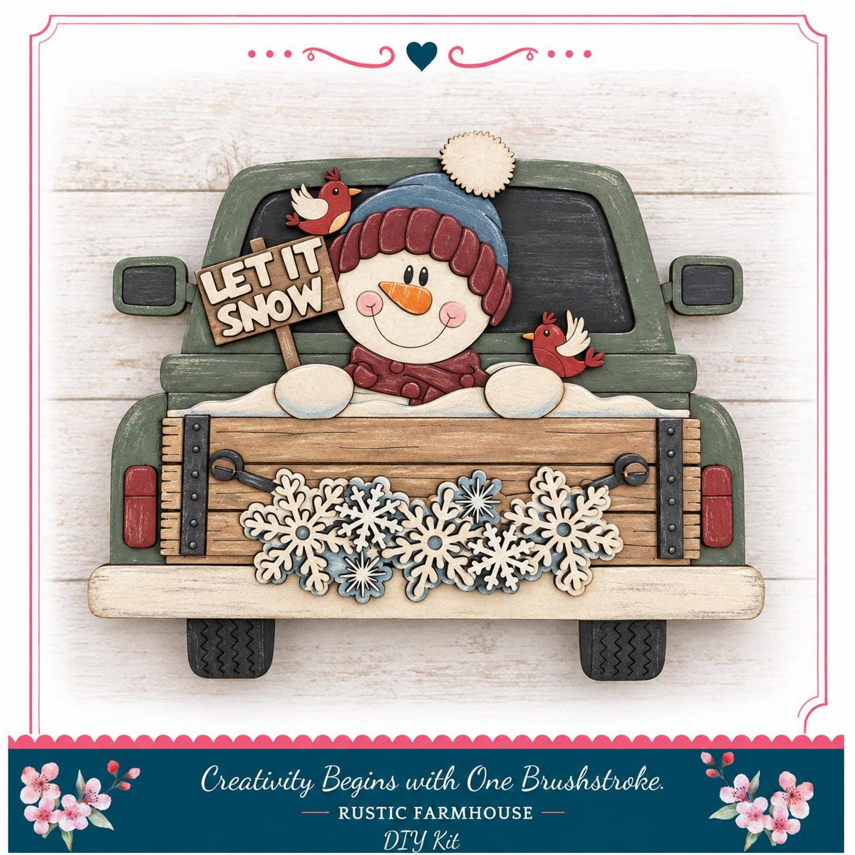 A wooden truck decorated with a snowman, birds, and snowflakes, with a sign that says "LET IT SNOW".