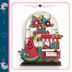 A wooden sign with a watermelon and flowers, along with the text "Sweet summer" and "Sweetness on the vine", is displayed in the image.