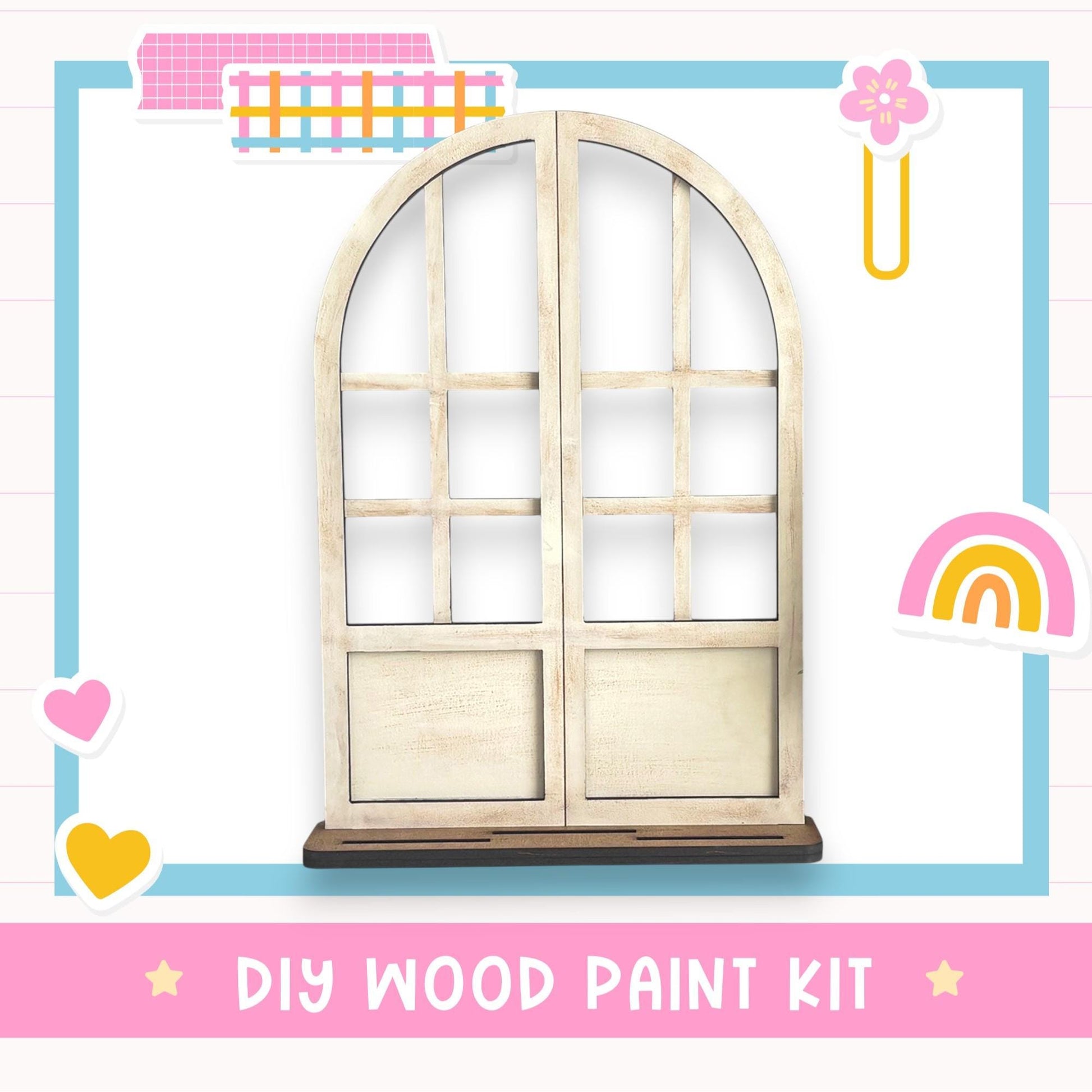 a DIY wood paint kit, including a wooden archway and various colorful stickers.