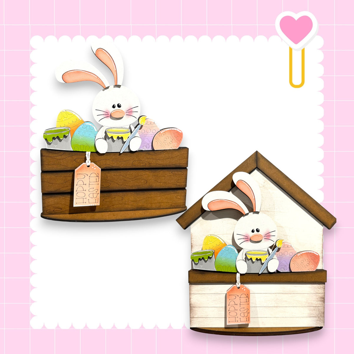 two wooden baskets with Easter eggs inside, each containing a bunny. The baskets are decorated with Easter-themed elements, such as eggs and a heart. The baskets are set against a pink background with a scalloped edge.