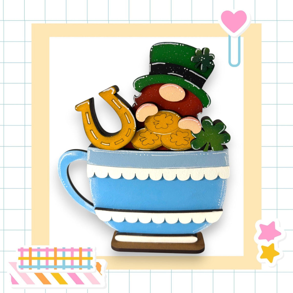 a picture of a cup with a teddy bear in it
