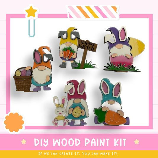 a group of wooden toys sitting on top of a table