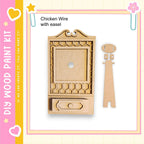 a wooden frame with a decorative design, and there is a small wooden piece next to it. The frame appears to be a part of a larger wooden structure, possibly a cabinet or a shelf.