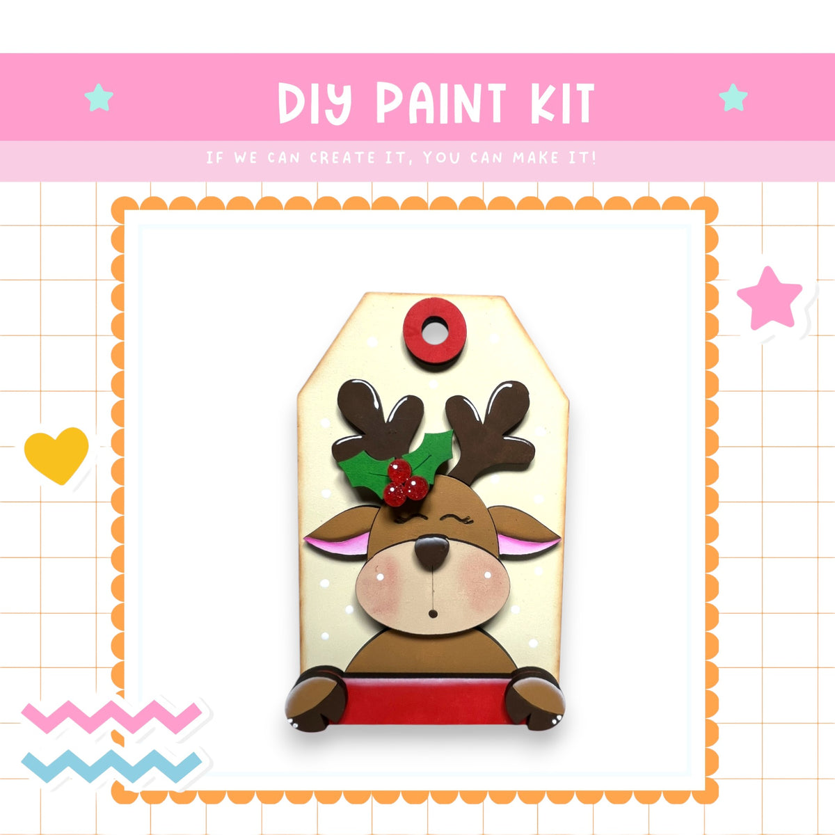 a DIY paint kit with a cute reindeer-like character on a tag. The kit appears to be a creative project that allows users to customize their own tag with a personalized design.