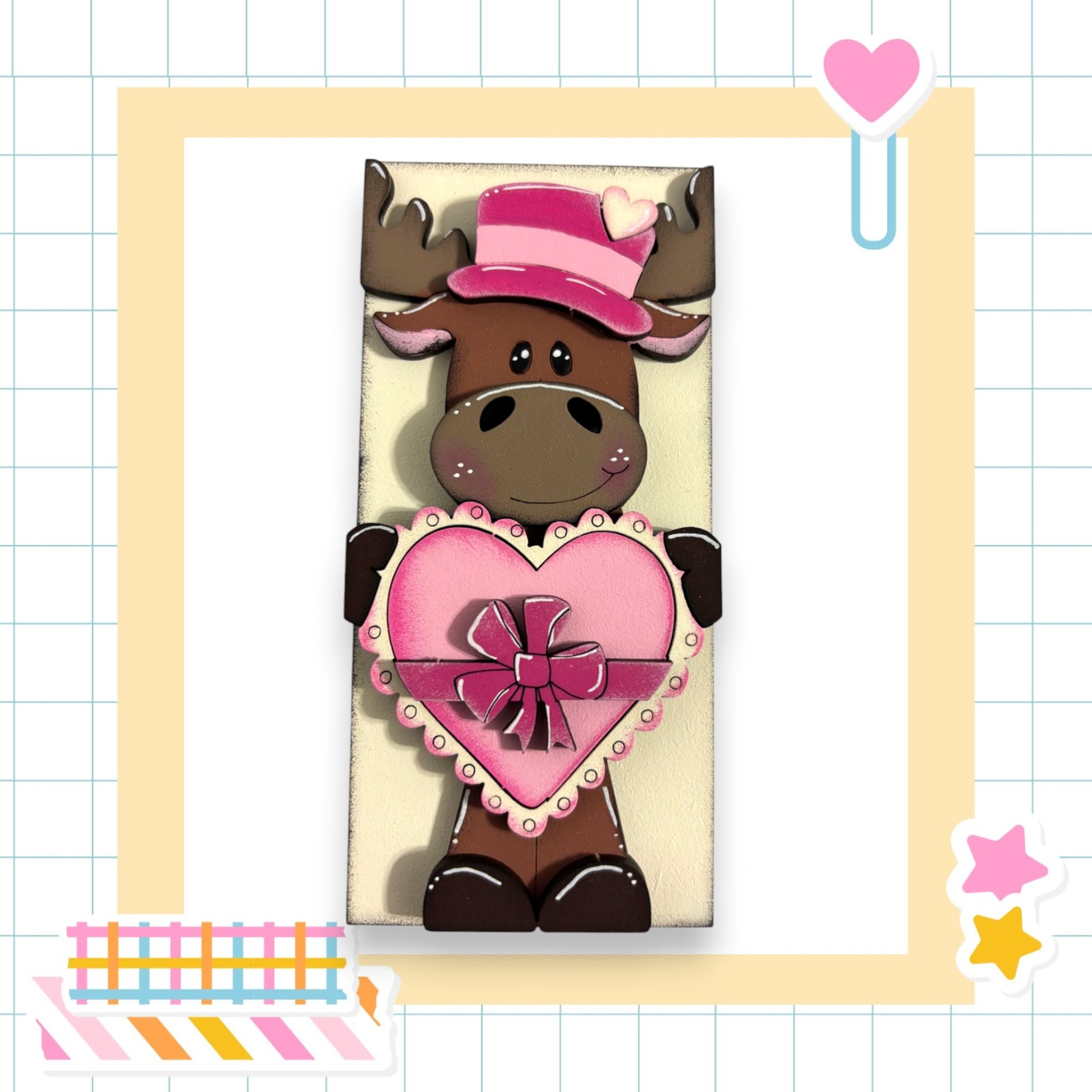 a card with a moose holding a heart