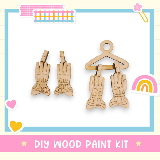 a DIY wood paint kit, including two wooden gloves and a wooden hanger.