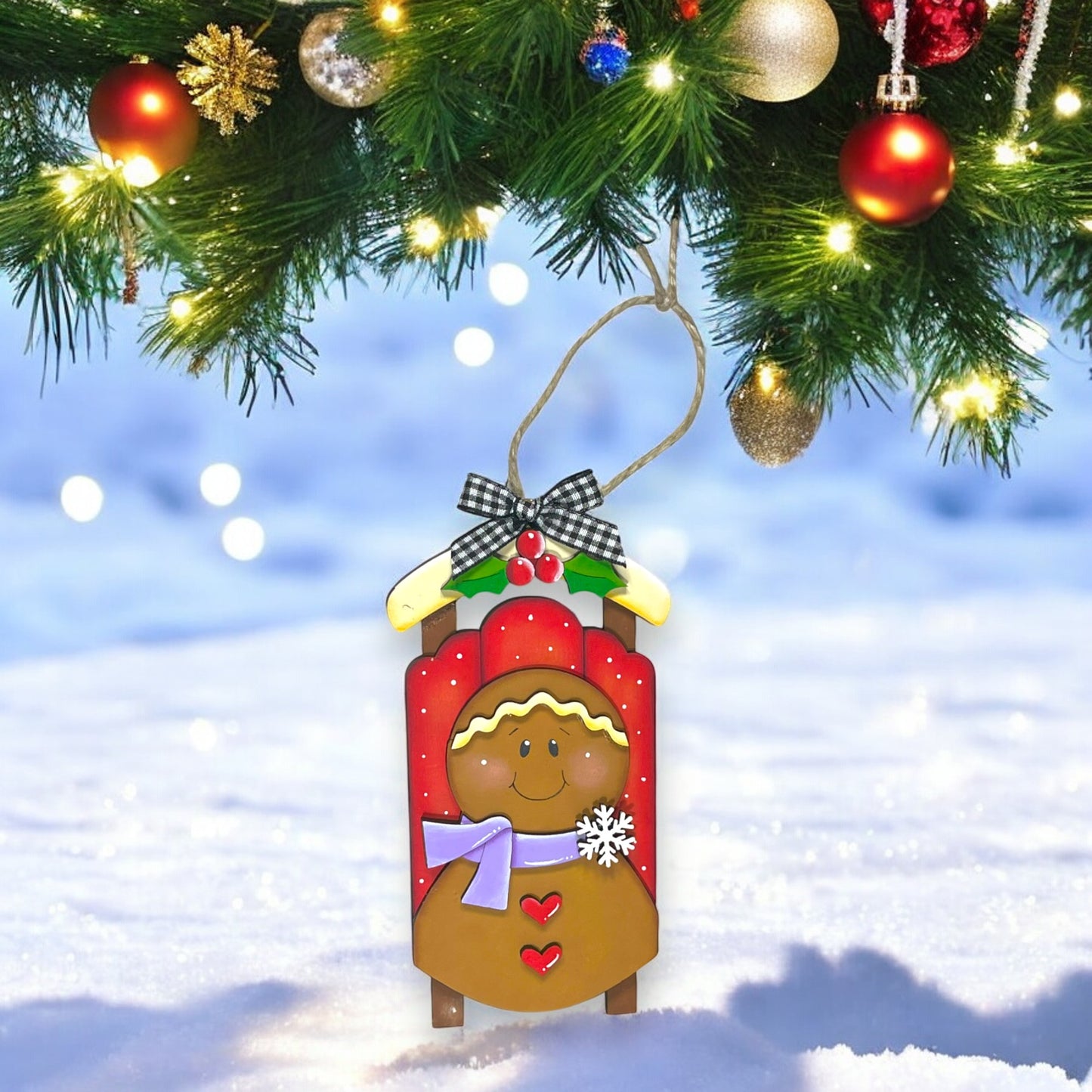 a christmas ornament hanging from a christmas tree