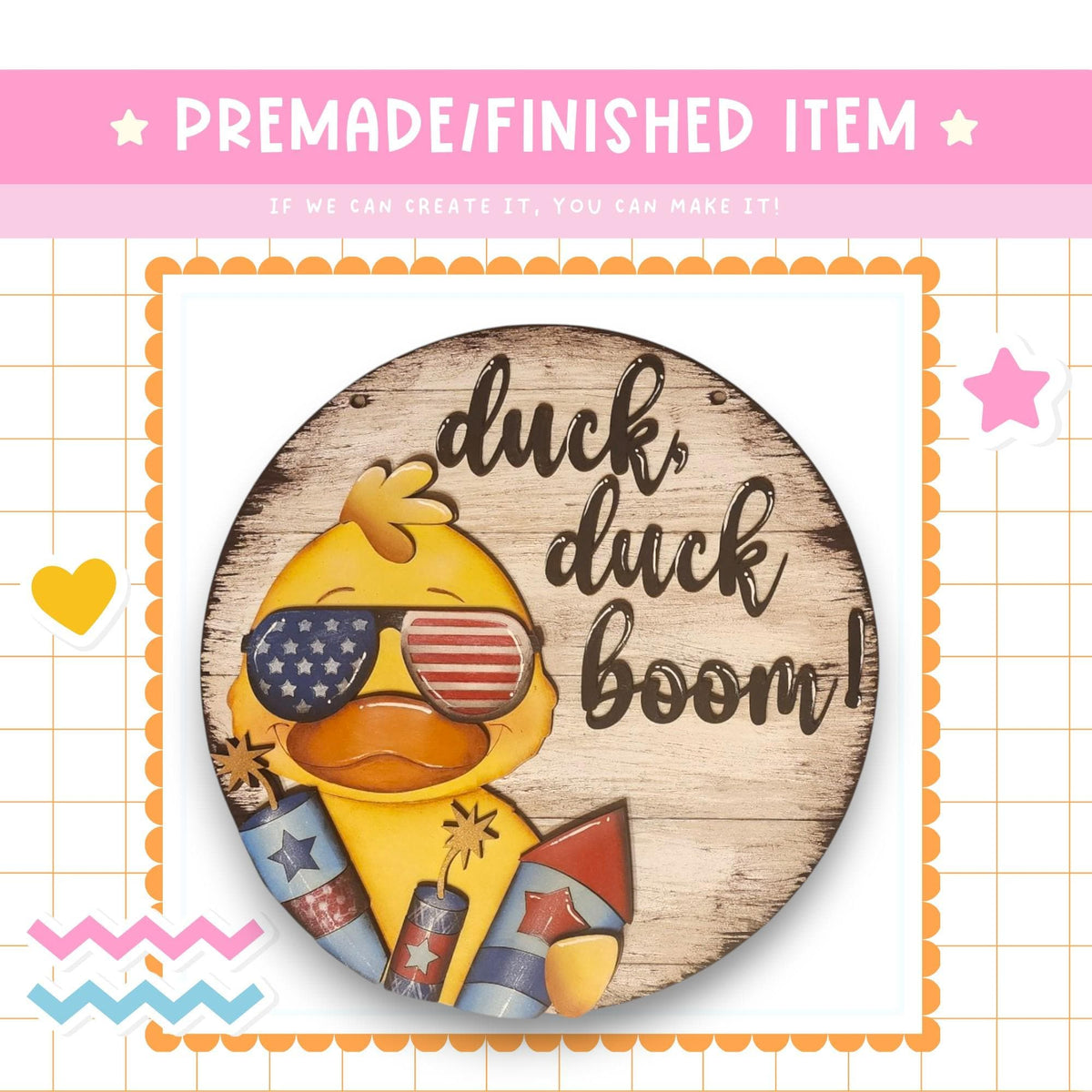 a wooden sign with a duck wearing sunglasses and holding fireworks, accompanied by the text "duck, duck boom!"